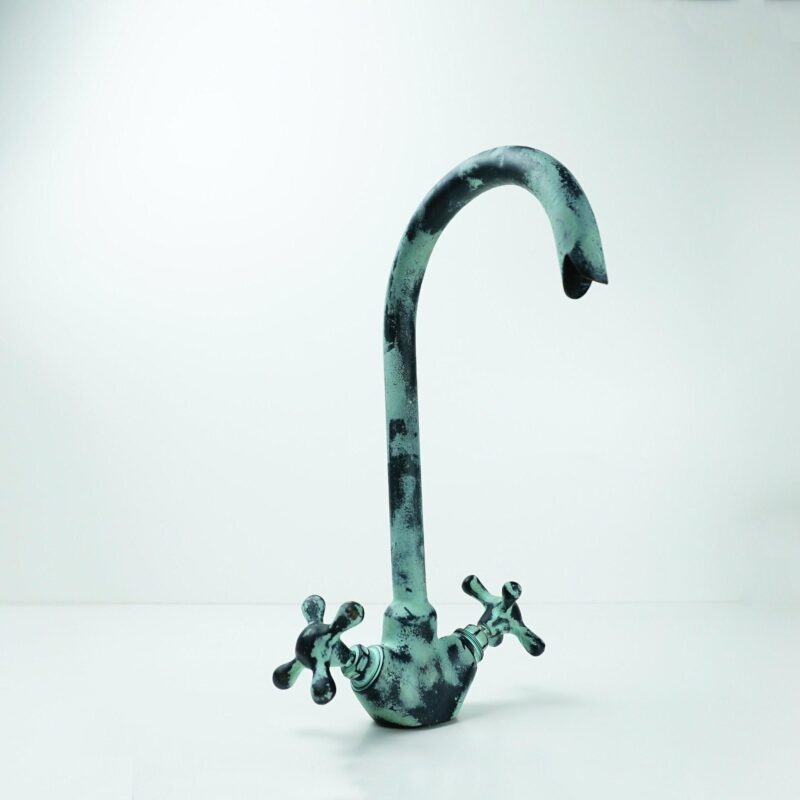 Antique Brass Bathroom Faucet with Gooseneck Spout and Luxurious Patina