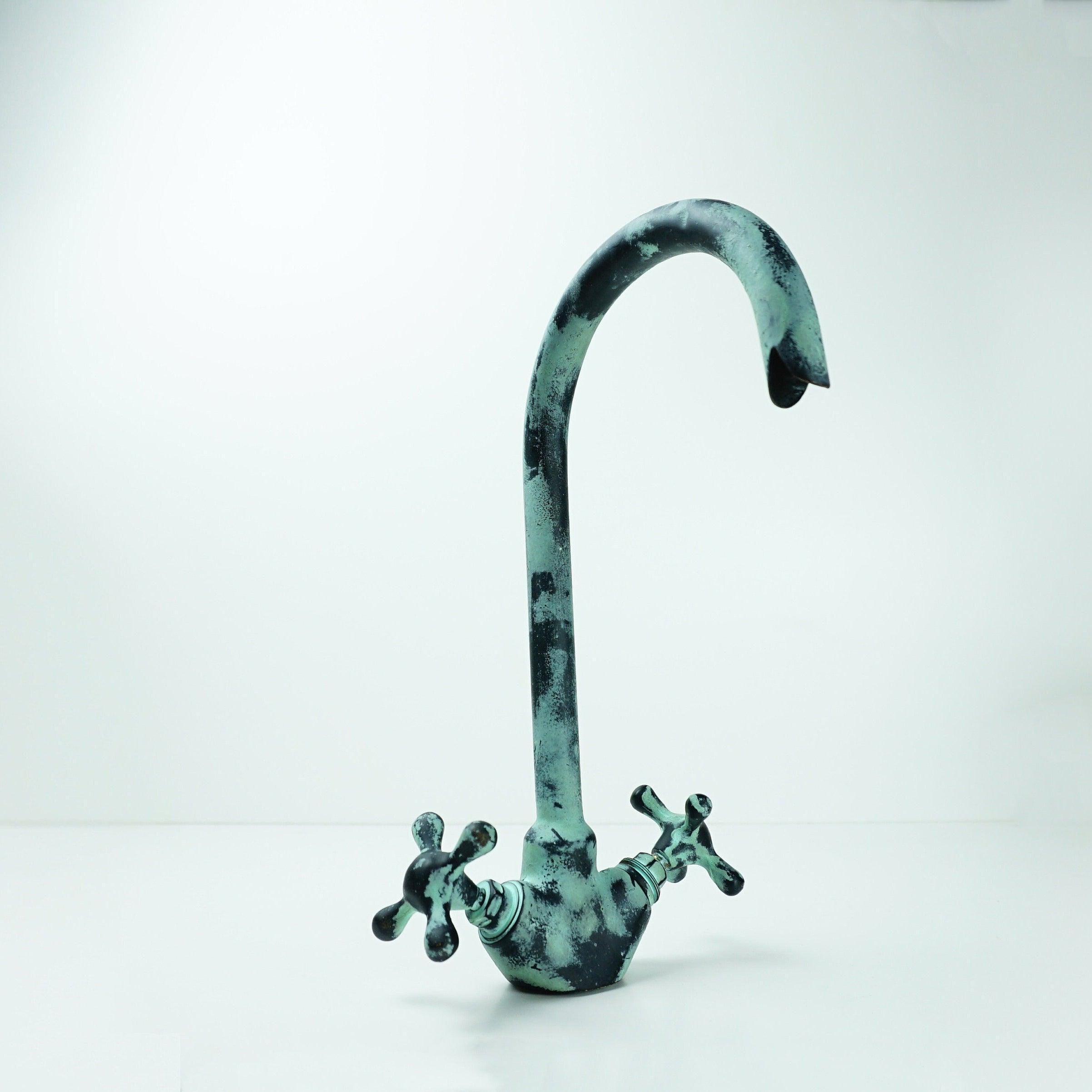 Antique Brass Bathroom Faucet with Gooseneck Spout and Luxurious Patina