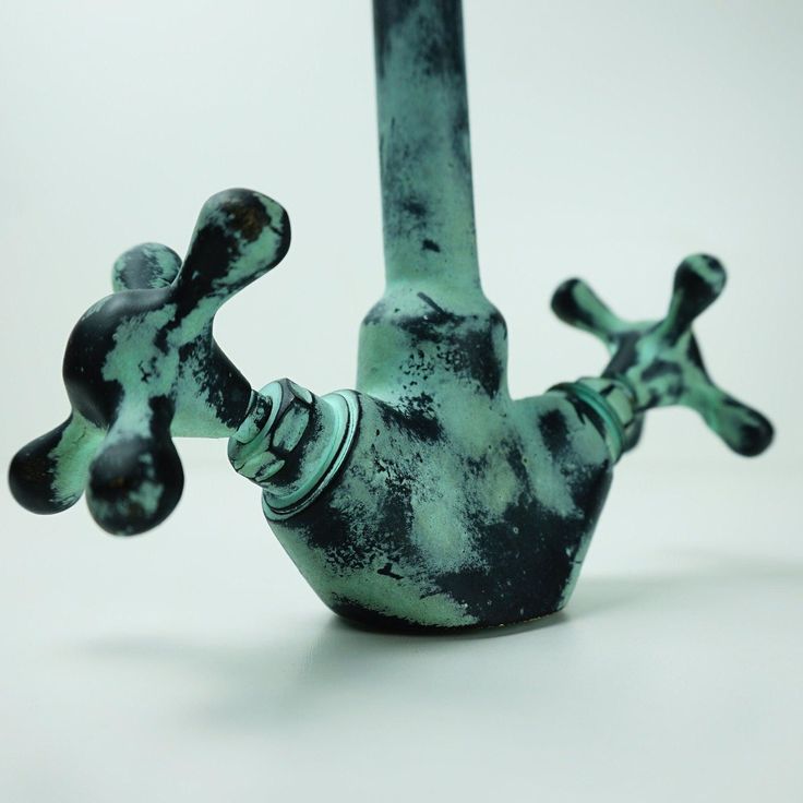 Timeless Beauty: Antique Brass Bathroom Faucet with Gooseneck Spout and Luxurious Patina