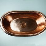 Vintage Charm: Green Patina Copper Tub-Style Vessel Sink Vanity