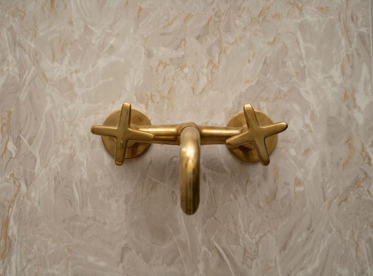A Timeless Classic: The Unlacquered Brass Bathroom Tub Filler Faucet