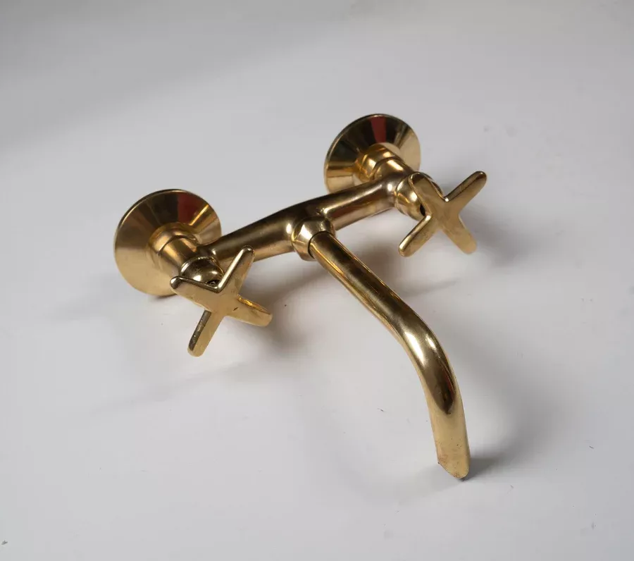 Bring the Industrial Look to Your Bathroom with This Unlacquered Brass Faucet