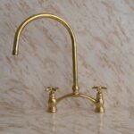 "Rustic Elegance: Unlacquered Brass Kitchen Farmhouse Sink Faucet
