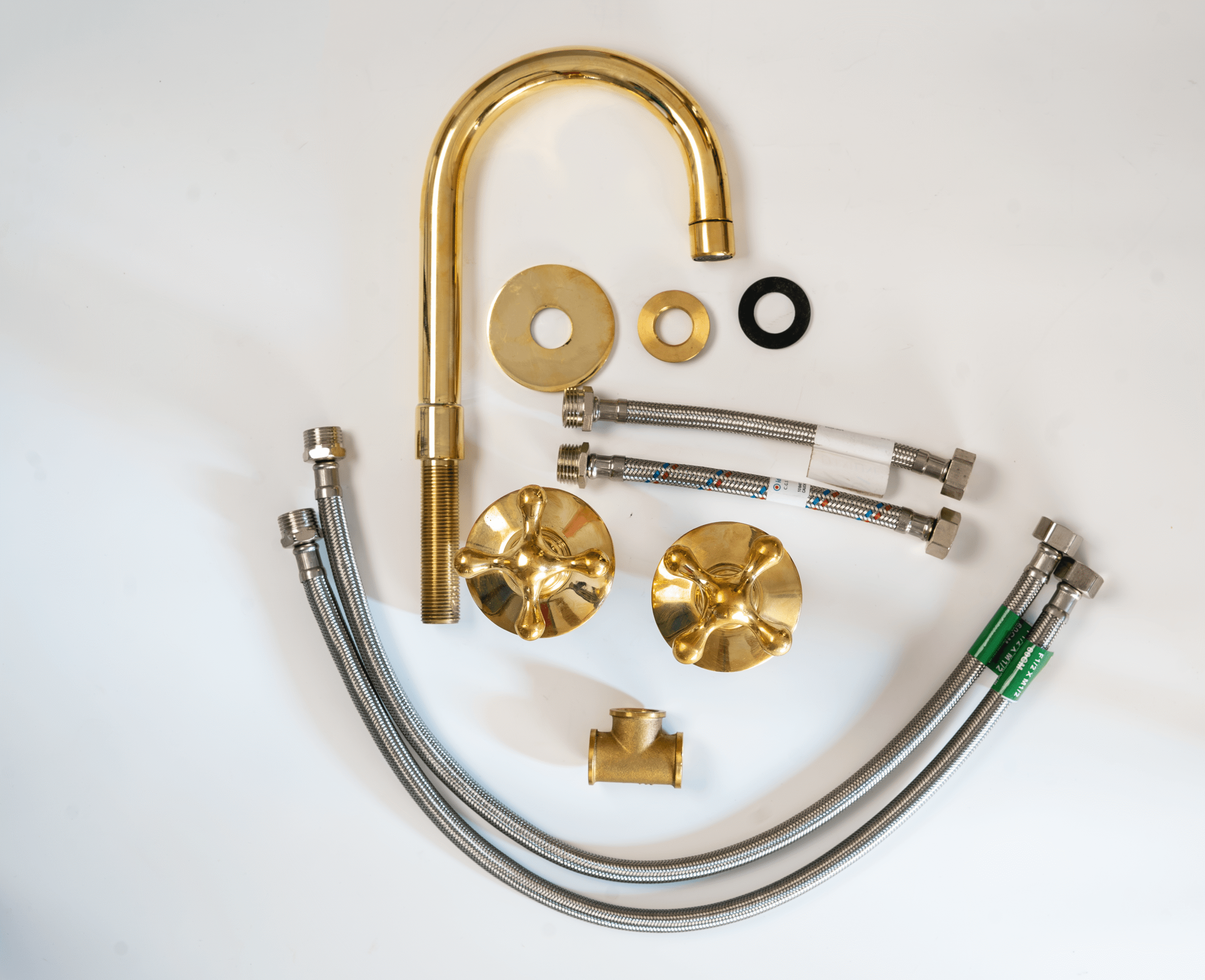 Sleek and Sophisticated: The Widespread Unlacquered Brass Bathroom Faucet
