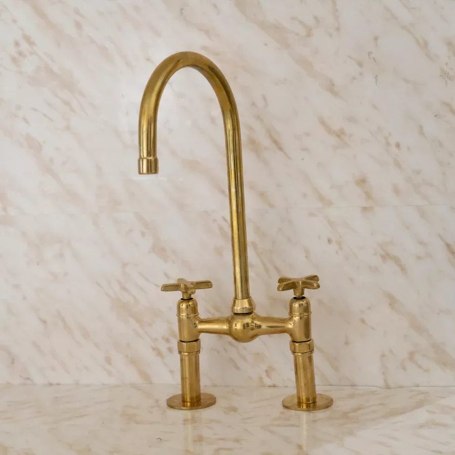 Unlacquered Brass Bridge Kitchen Faucet with Ball Center: A Touch of Rustic Elegance