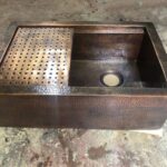 "Vintage Treasures: Handcrafted Aged Copper Farmhouse Sink with Flat Grid